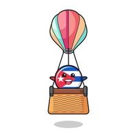 Mascote da bandeira de Cuba em um balão de ar quente vetor