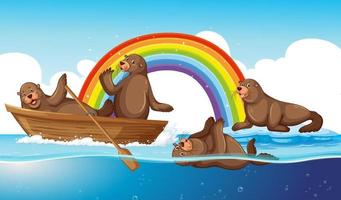 desenho de animais de leões marinhos na água com arco-íris vetor