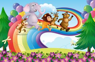 Um grupo de animais no arco-íris vetor