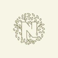 inicial n ou letra n com ornamento de folha no design de ilustração de ícone de vetor de logotipo moderno de luxo círculo