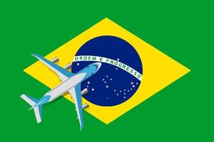 ilustração em vetor de um avião de passageiros sobrevoando a bandeira do brasil. conceito de turismo e viagens