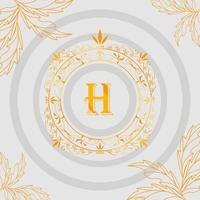 monograma circular dourado com h vetor