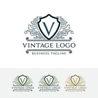 design de logotipo vintage letra v vetor