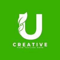 letra u com elemento de design de logotipo de folha sobre fundo verde. utilizável para logotipos de negócios, ciência, saúde, médicos e natureza vetor