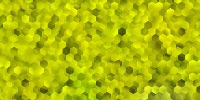 textura de vetor verde e amarelo claro com hexágonos coloridos.