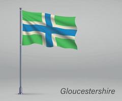 acenando a bandeira de gloucestershire - condado da inglaterra no mastro da bandeira. vetor