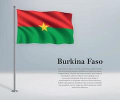 acenando a bandeira do burkina faso no mastro da bandeira. modelo para independente vetor