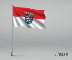 acenando a bandeira de hesse - estado da alemanha no mastro. modelo para vetor