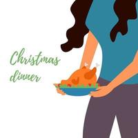 a garota pega a bandeja de peru de frango. comida deliciosa. ceia de Natal. prato festivo