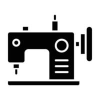 ícone de glifo de máquina de costura vetor