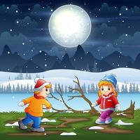 crianças brincando na paisagem noturna de inverno vetor