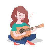 A rapariga feliz que joga a guitarra e canta uma canção, isolada no fundo branco