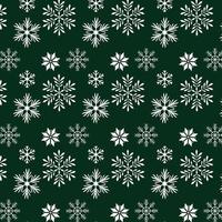 flocos de neve em design de fundo verde vetor