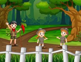 ilustração de menino e menina escoteiros caminhando por uma estrada de terra na floresta