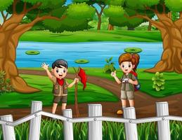 ilustração de menino e menina escoteiros caminhando por uma estrada de terra na floresta