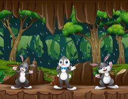 bonitos três de coelhos na ilustração de entrada da caverna vetor