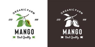 ilustração de logotipo de frutas de manga vintage adequada para loja de frutas e fazenda de frutas vetor
