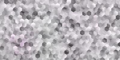 pano de fundo vector roxo claro com um lote de hexágonos.