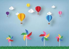 balão colorido e nuvem no céu azul e cata-vento com design de arte de papel, elemento de design vetorial e ilustração