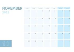 modelo de calendário para novembro de 2022, a semana começa na segunda-feira. o calendário está em um esquema de cores azul. vetor