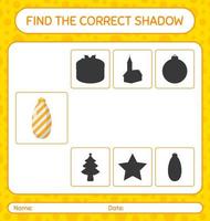encontre o jogo de sombras correto com enfeite de natal. planilha para crianças pré-escolares, folha de atividades para crianças vetor