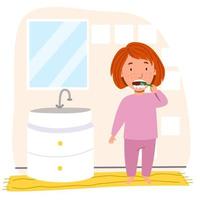 uma garota europeia com cabelo vermelho de pijama está escovando os dentes no banheiro. vetor