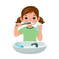 menina bonitinha escovando os dentes com pasta de dente segurando um copo de água para limpar a atividade de higiene de rotina diária vetor