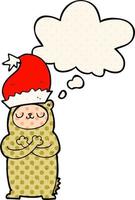 urso de desenho animado usando chapéu de natal e balão de pensamento no estilo de quadrinhos vetor