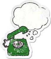 telefone antigo de desenho animado e bolha de pensamento como um adesivo desgastado vetor
