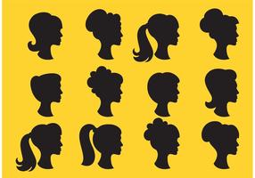 Conjunto de silhuetas de um perfil de meninas com cabelos voadores. vetor