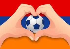 bola de futebol da armênia e forma de coração de mão vetor
