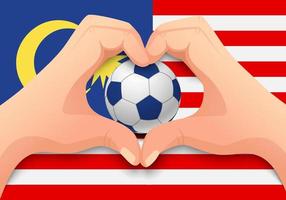 bola de futebol da malásia e forma de coração de mão vetor