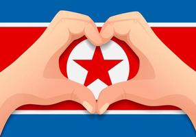bandeira da coreia do norte e forma de coração de mão vetor