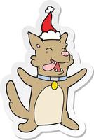 desenho de adesivo de um cachorro feliz usando chapéu de papai noel vetor