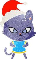 bonito desenho retrô de um gato usando chapéu de papai noel vetor