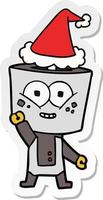 desenho de adesivo feliz de um robô acenando olá usando chapéu de papai noel vetor