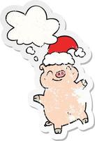 desenho animado feliz natal porco e balão de pensamento como um adesivo desgastado vetor