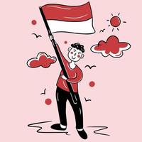um menino segurando a bandeira da Indonésia vetor