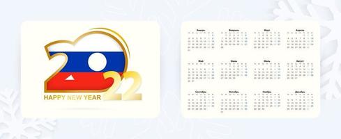 calendário de bolso horizontal 2022 em língua russa. ícone de ano novo 2022 com bandeira da rússia. vetor