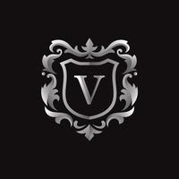 prata ou cinza com a letra inicial do distintivo v imagem vetorial de luxo vetor