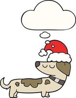 cão de desenho animado usando chapéu de natal e balão de pensamento vetor