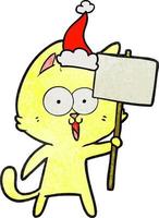 engraçado desenho texturizado de um gato com placa usando chapéu de papai noel vetor