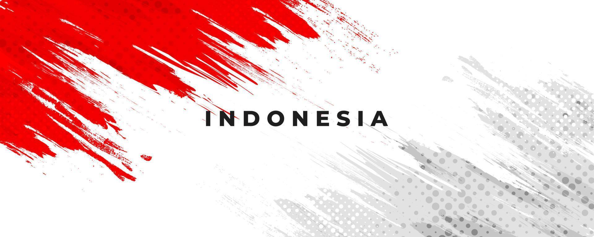 bandiera dell'indonesia con il concetto di pennello. felice festa dell'indipendenza indonesiana. bandiera dell'indonesia in stile grunge vettore