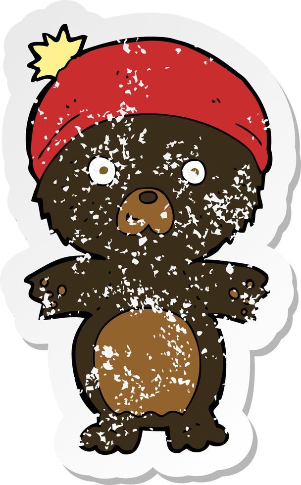 adesivo retrò in difficoltà di un simpatico orso nero cartone animato con cappello vettore