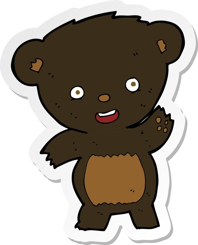 adesivo di un cartone animato sventolando orso nero vettore