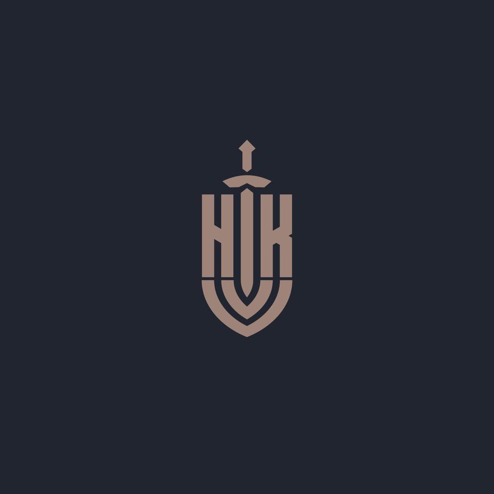 HK logo monogramma con spada e scudo stile design modello vettore