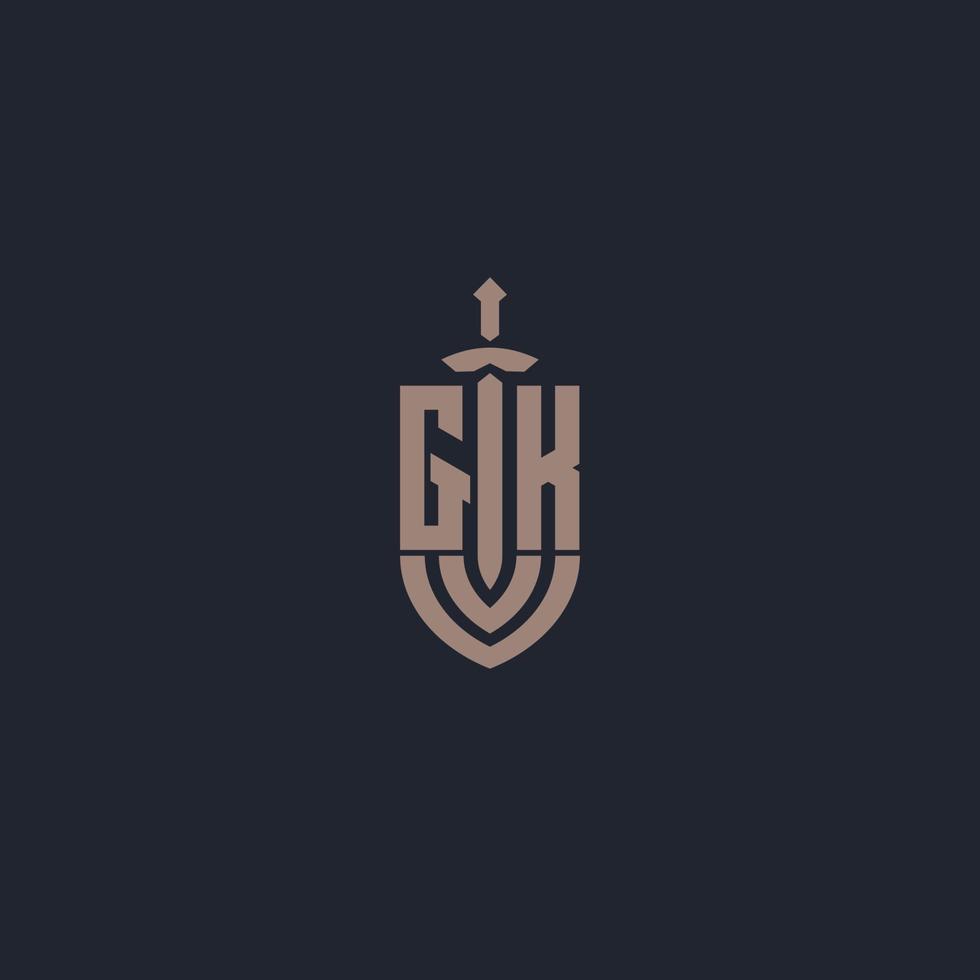 gk logo monogramma con spada e scudo stile design modello vettore