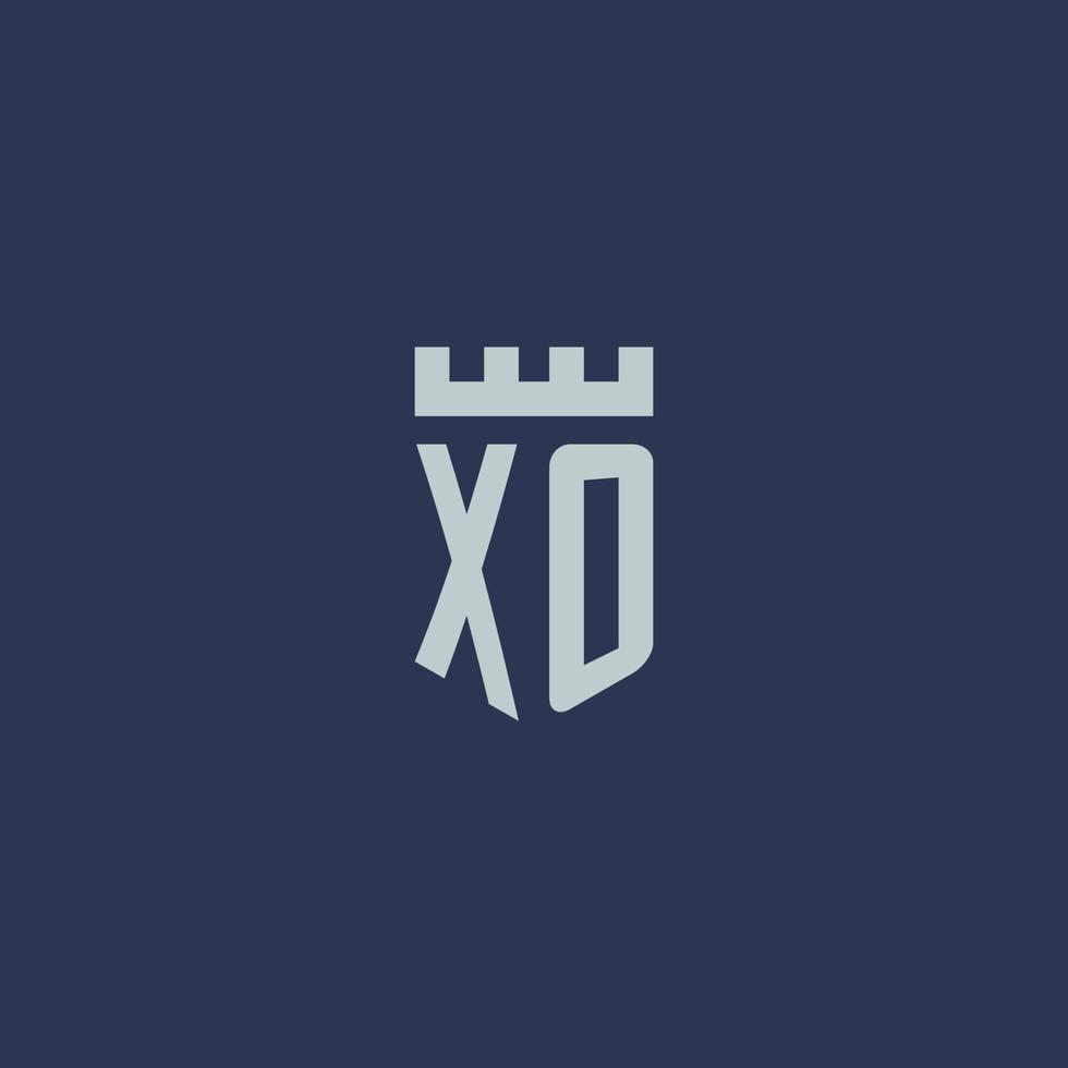 xo logo monogramma con fortezza castello e scudo stile design vettore