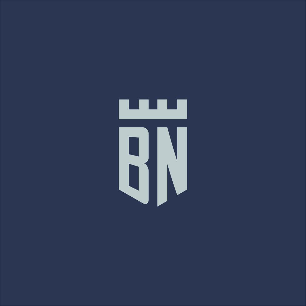 bn logo monogramma con fortezza castello e scudo stile design vettore