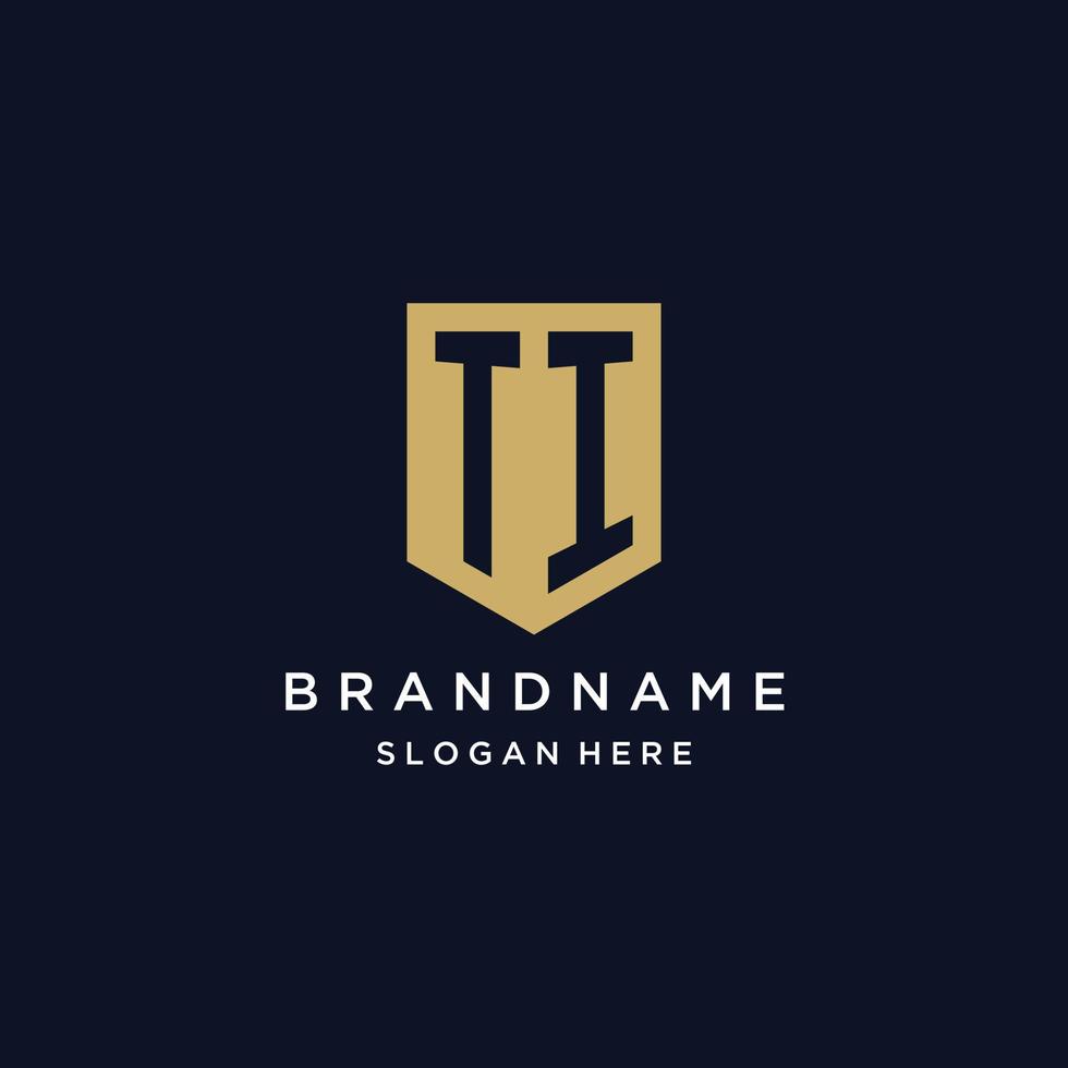 ti monogramma iniziali logo design con scudo icona vettore